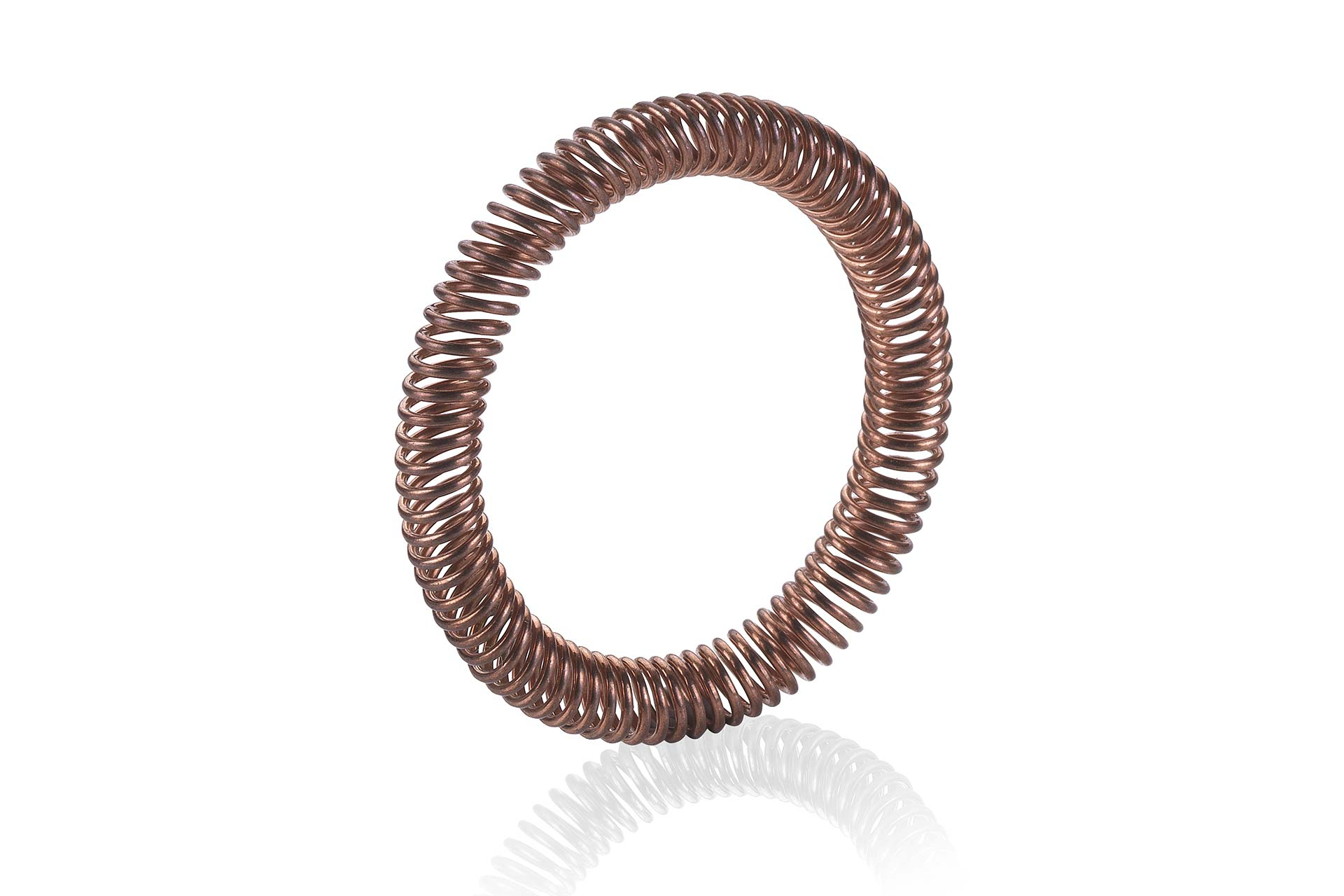 Copper contact canted coil spring